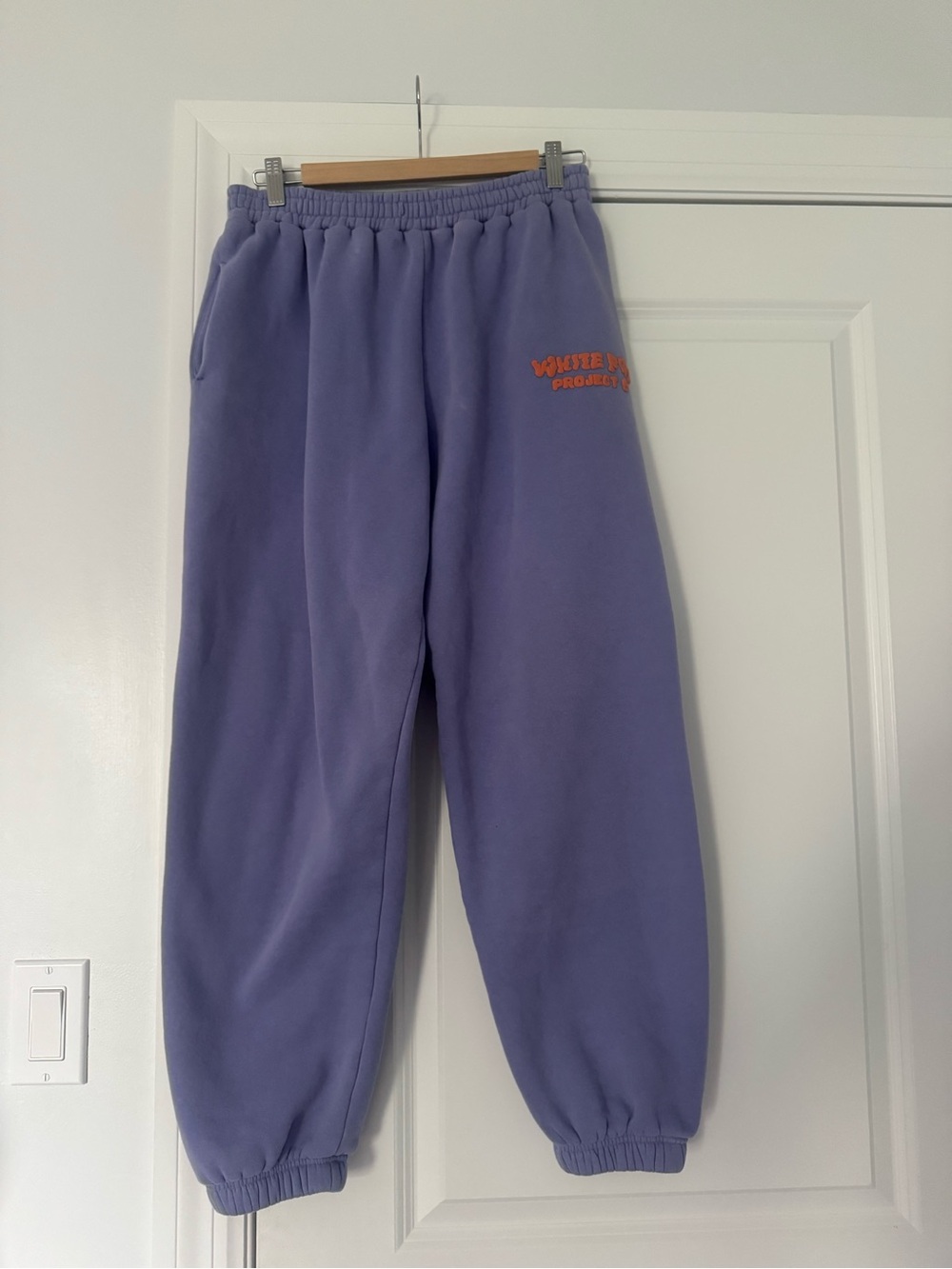 White Fox Boutique Lavender Kids Sweatpants with Orange Logo